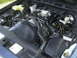 1997 Ford Crown Victoria - Engine bay detail showing the fan shroud with warning text.