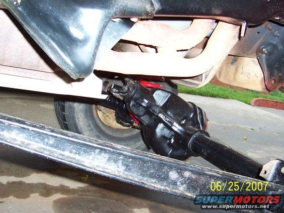 close-up of a vehicle's rear differential and exhaust system
