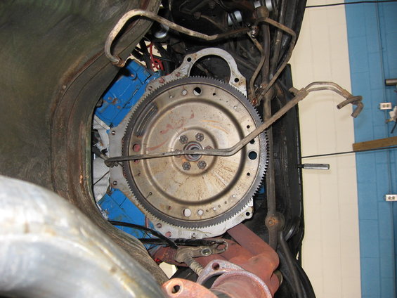 Close-up of engine flywheel and transmission bell housing