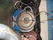 1973 Ford Ranchero - Underside view of engine and transmission components, likely during a swap or repair.