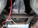 1973 Ford Ranchero - Close-up of vehicle undercarriage showing transmission and exhaust components.