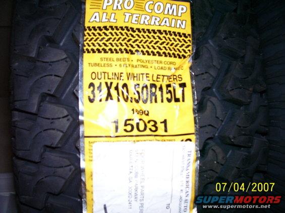 Pro Comp All Terrain tire with size 31x10.50R15LT and part number 15031 on yellow label