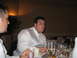1988 Ford Bronco - Wedding reception scene with two men in formal attire at a table.