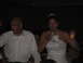 1988 Ford Bronco - Man and woman at a wedding reception, both holding drinks.