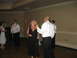 1988 Ford Bronco - Guests dance at a wedding reception, with a watermark for SUPERMOTORS.net visible.