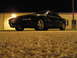 1995 Ford Probe - Black 1995 Ford Probe parked outside a building at night, showing its front quarter.