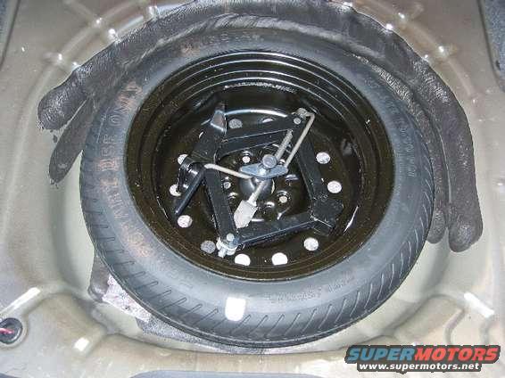 spare_tire_well.jpg wheel well. maybe a zex bottle holder in the future?