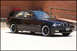 1998 BMW 3 Series - This black 1998 BMW 3 Series coupe features aftermarket wheels and a tan interior.