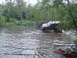 2005 Dodge 1500 - Off-road vehicle stuck in mud and water, with a watermark indicating the date 2007 6 30.