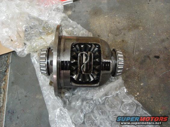 Differential with visible gears and bearings, wrapped in bubble wrap