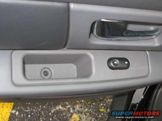 19. Driver Side Rear Window Controls