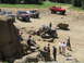 1979 Ford Bronco - Off-road vehicles and spectators gather on a rocky, dirt terrain during an event.