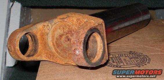 Rusted slip yoke part with '20' visible