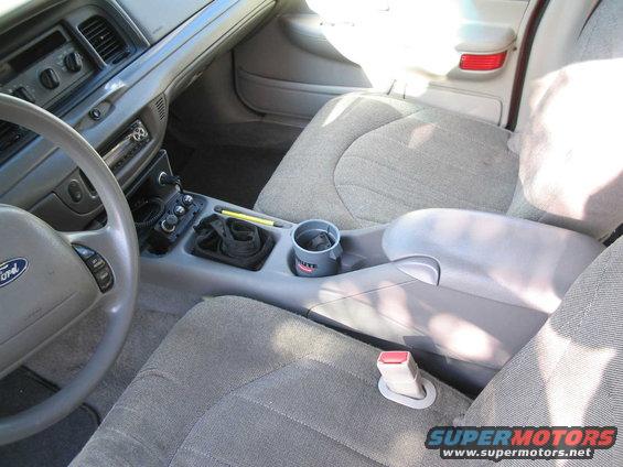 95 Taurus console installed. Lots of cutting and fitting to get it to work. Still not perfect but it's in there!