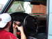 1994 Ford Bronco - The column is dropped & the cluster is being removed. The glove box, radio, & ash tray are out, and the A/C panel is lo…