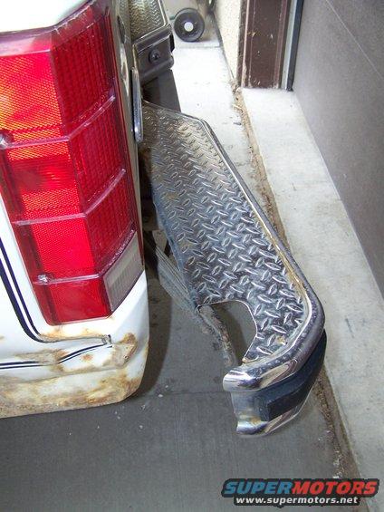 my guess...    guard post + bronco + alcohol = flexi-bumper.