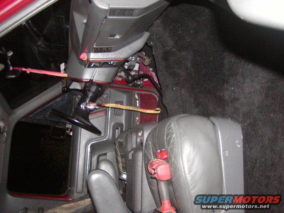 1991 Ford Bronco interior showing steering wheel, seats, and carpet