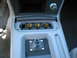 "Ashtray" open, extra power outlets for phone charger, GPS, stove, TV, microwave oven......