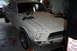 1968 Ford Mustang - This 1967 Ford Mustang is in a garage, possibly being restored, with tools visible.