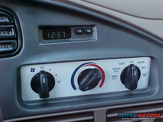 mvc007s.jpg hvac panel with the dash reinstalled, and a new in-dash clock!!