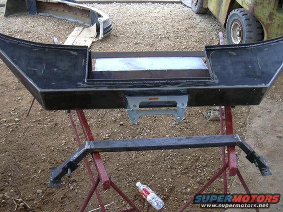 Custom front bumper with winch mount, on sawhorses