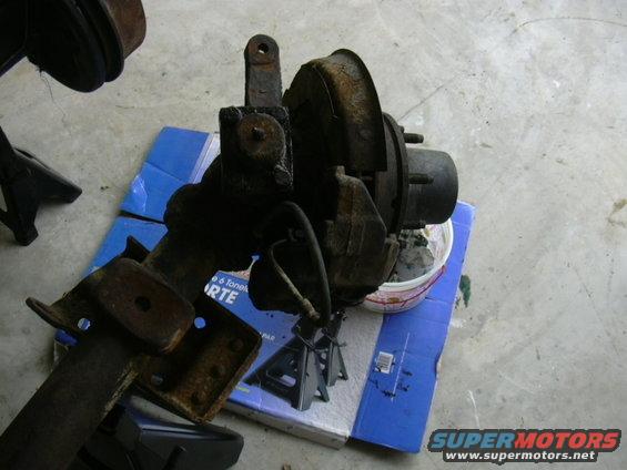 Front axle assembly with brake components on blue box