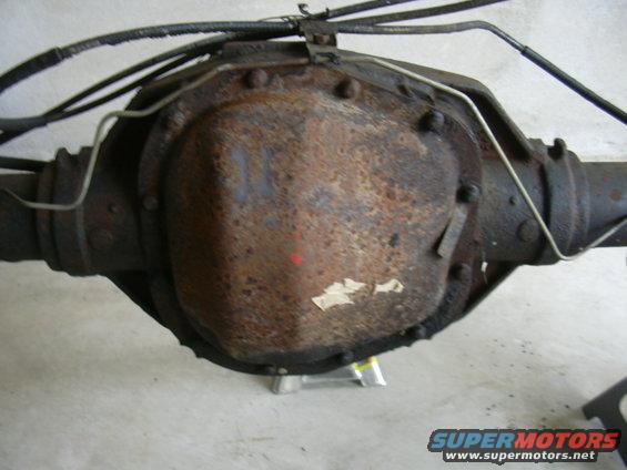 rusty rear axle differential with brake lines attached
