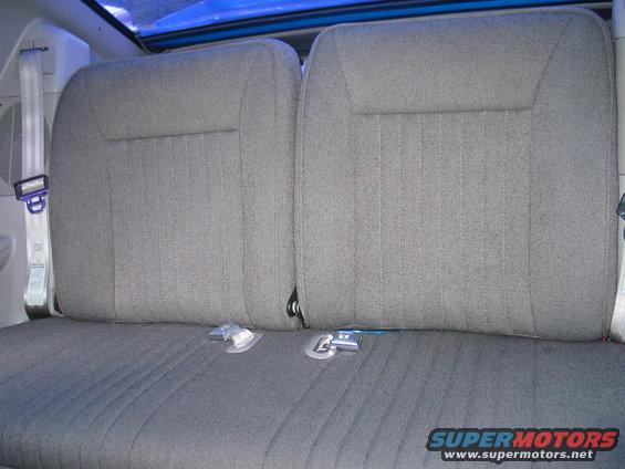 Gray fabric rear seat with seatbelts