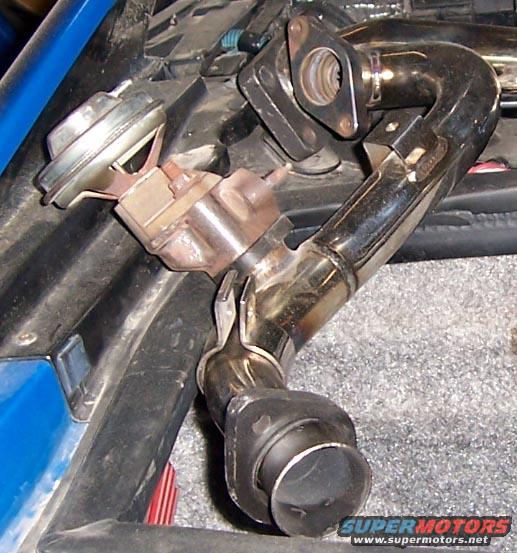 Exhaust pipe and wastegate actuator assembly, chrome finish, close-up view