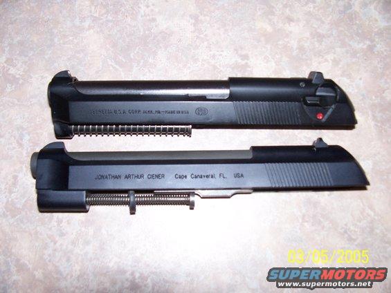 Two Beretta pistol slides, one with "BERETTA U.S.A. CORP. ACKER, PA. - MADE IN U.S.A." and the other with "JONATHAN ARTHUR CIENER Cape Canaveral, FL. USA"
