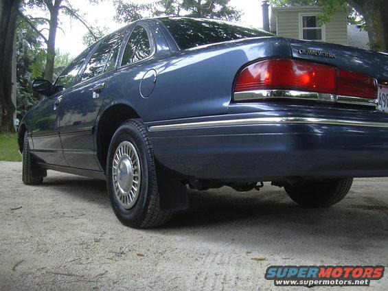 Rear view of a blue 1996 Ford Crown Victoria with chrome trim