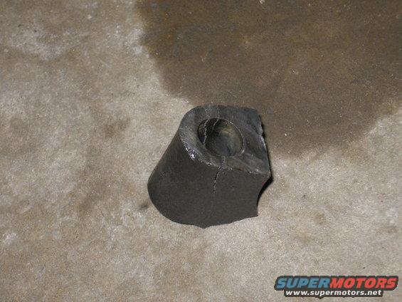 Broken rubber bushing on concrete floor