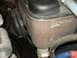 1998 Ford Crown Victoria - Close-up of a vehicle's coolant reservoir, showing fluid level markers.