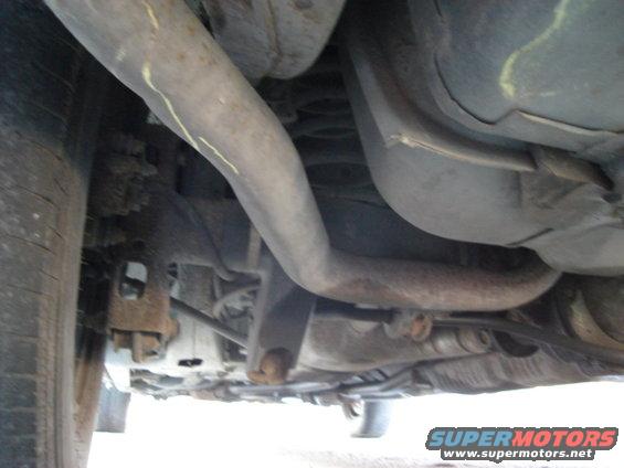 Underside view of exhaust system and suspension components
