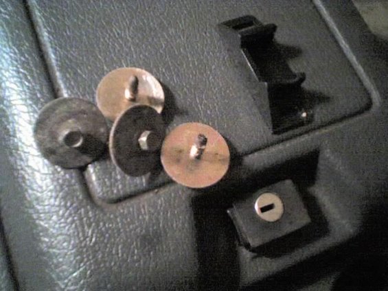 112706_2312.jpg Original mounting screws. and latch included. No Key, lock needs to be re-keyed. Internal latch removed so console opens.