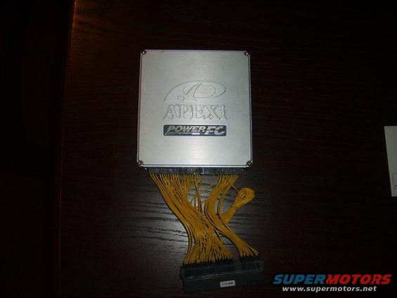 APEXi Power FC engine control unit with yellow wiring harness