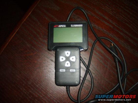 APEXi EL II Commander unit with a green screen and directional buttons