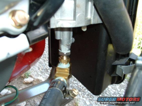 the carb was taken off  and taken apart all ports sealed off and fuel tube installed