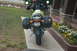 1998 BMW R1100GS ABS - A 1998 BMW R1100GS ABS motorcycle is parked on a sidewalk next to a house with a flower bed.