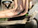1978 Ford Bronco - Rusty exhaust headers and suspension components are visible in this close-up view.