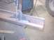 1990 Ford Ranger - A close-up view shows a metal bracket welded onto a steel beam, likely part of a bumper repair or fabrication project.