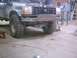 1990 Ford Ranger - The front grille and custom bumper of a 1990 Ford Ranger are visible in this workshop photo.