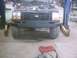 1990 Ford Ranger - The front of a 1990 Ford Ranger is shown, with the hood open and a custom bumper installed.