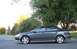 2005 Mazda 6 - Side view of a dark gray 2005 Mazda 6 sedan parked in a lot.