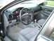 2005 Mazda 6 - The interior of a 2005 Mazda 6, a manual transmission and cloth seats.