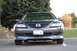 2005 Mazda 6 - A gray Mazda 6 is parked facing the camera, showing its front grille and headlights.