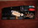 1977 Ford F-150 - This automotive AC unit has a "CAUTION" tag and a label indicating it is from "VINTAGE AIR, INC.", with the year '77 visible.
