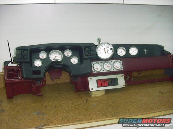 Car dashboard assembly with multiple gauges and switches