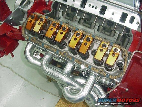 Engine with gold roller rockers and chrome headers