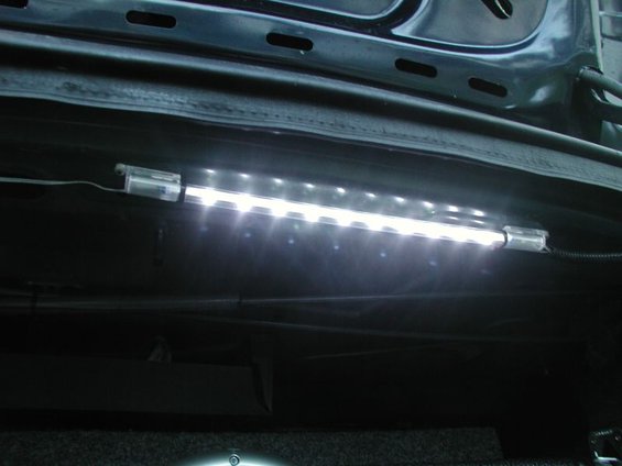 LED strip light mounted inside a vehicle trunk